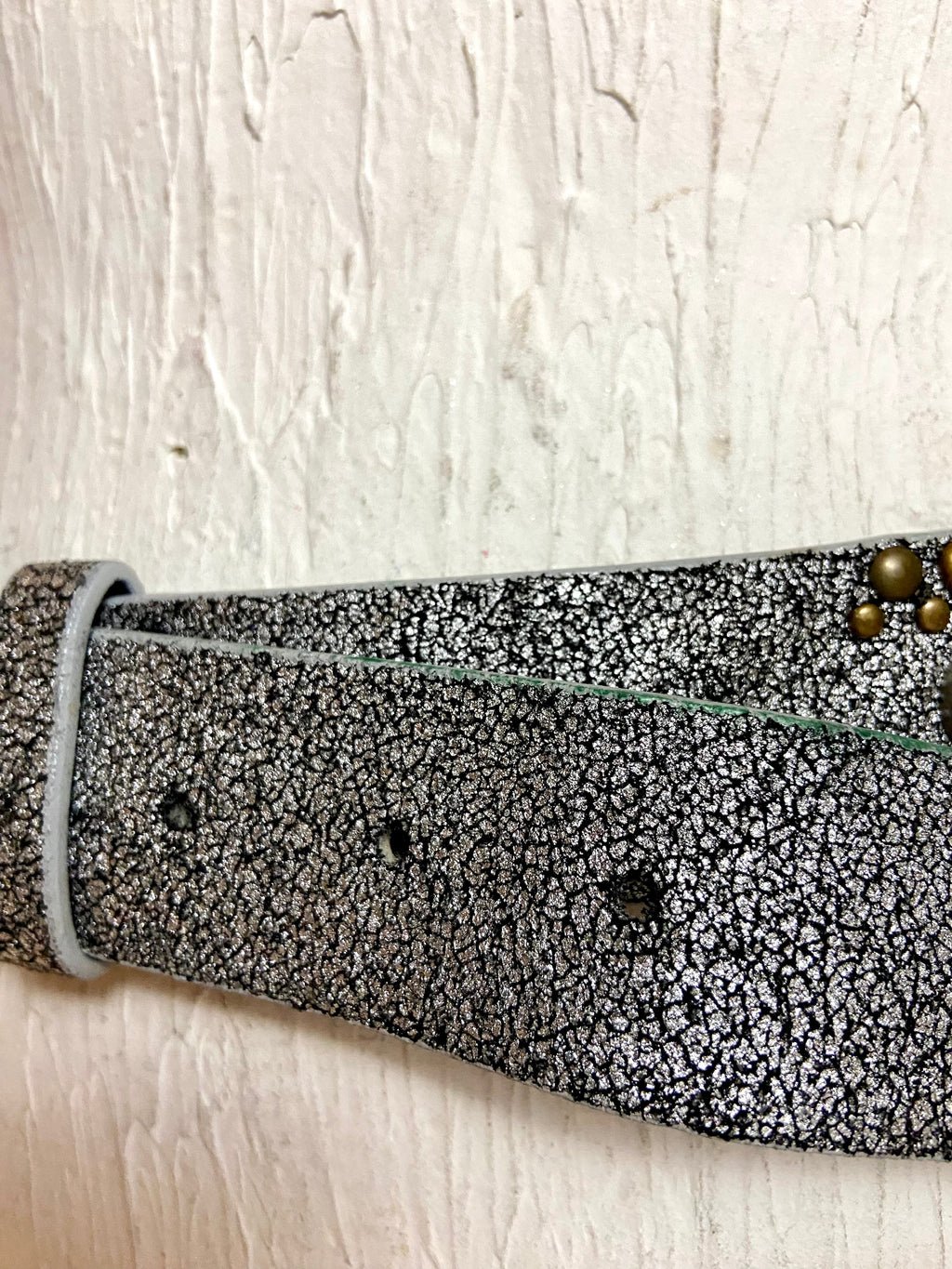 Metallic silver belt