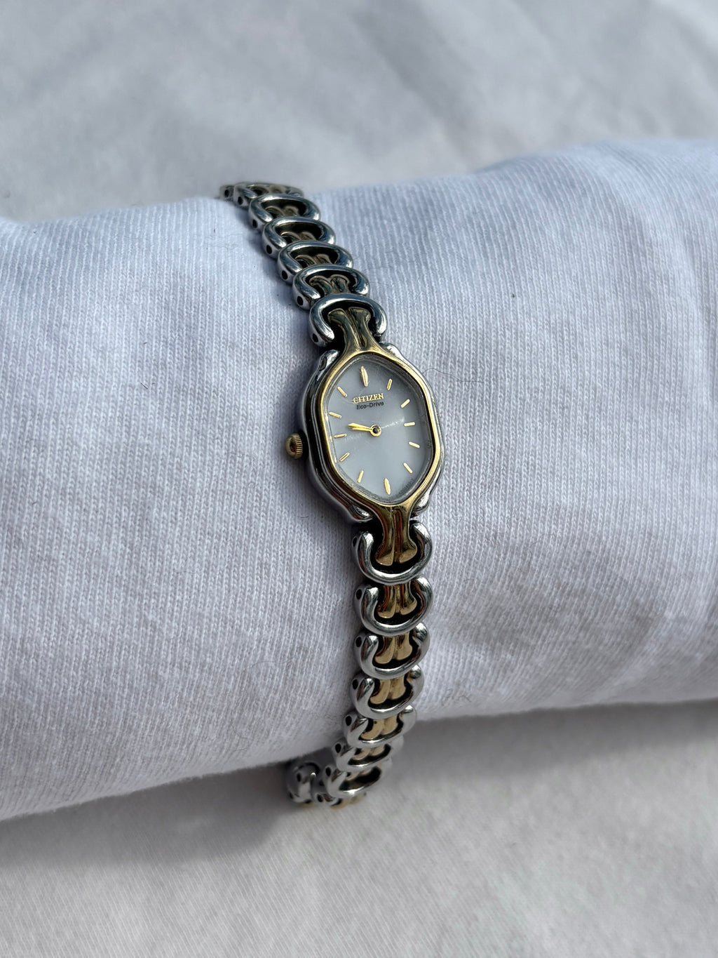 citizen silver pierced gold watch