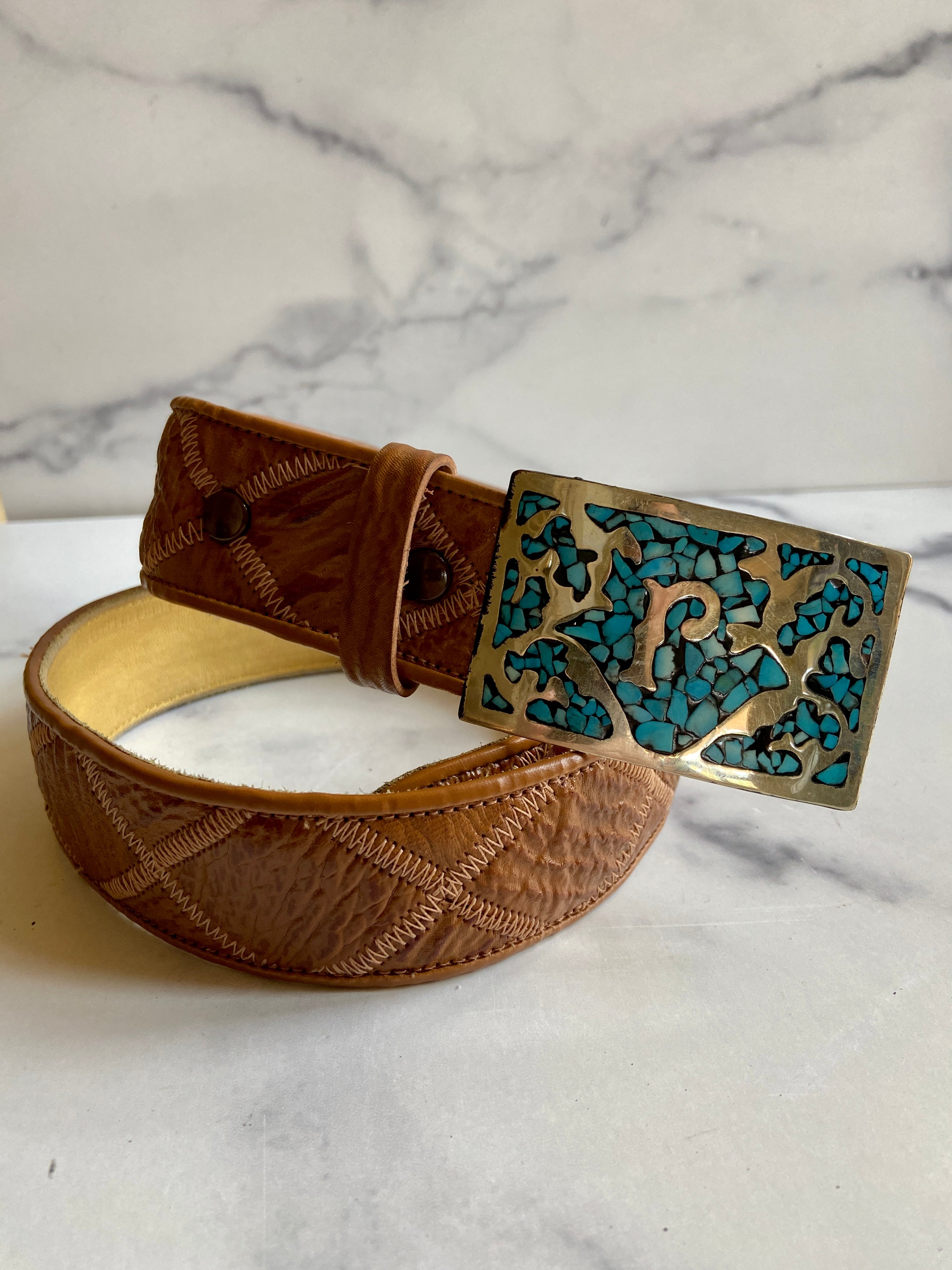 Turquoise Belt Buckle in a vintage leather tooled belt