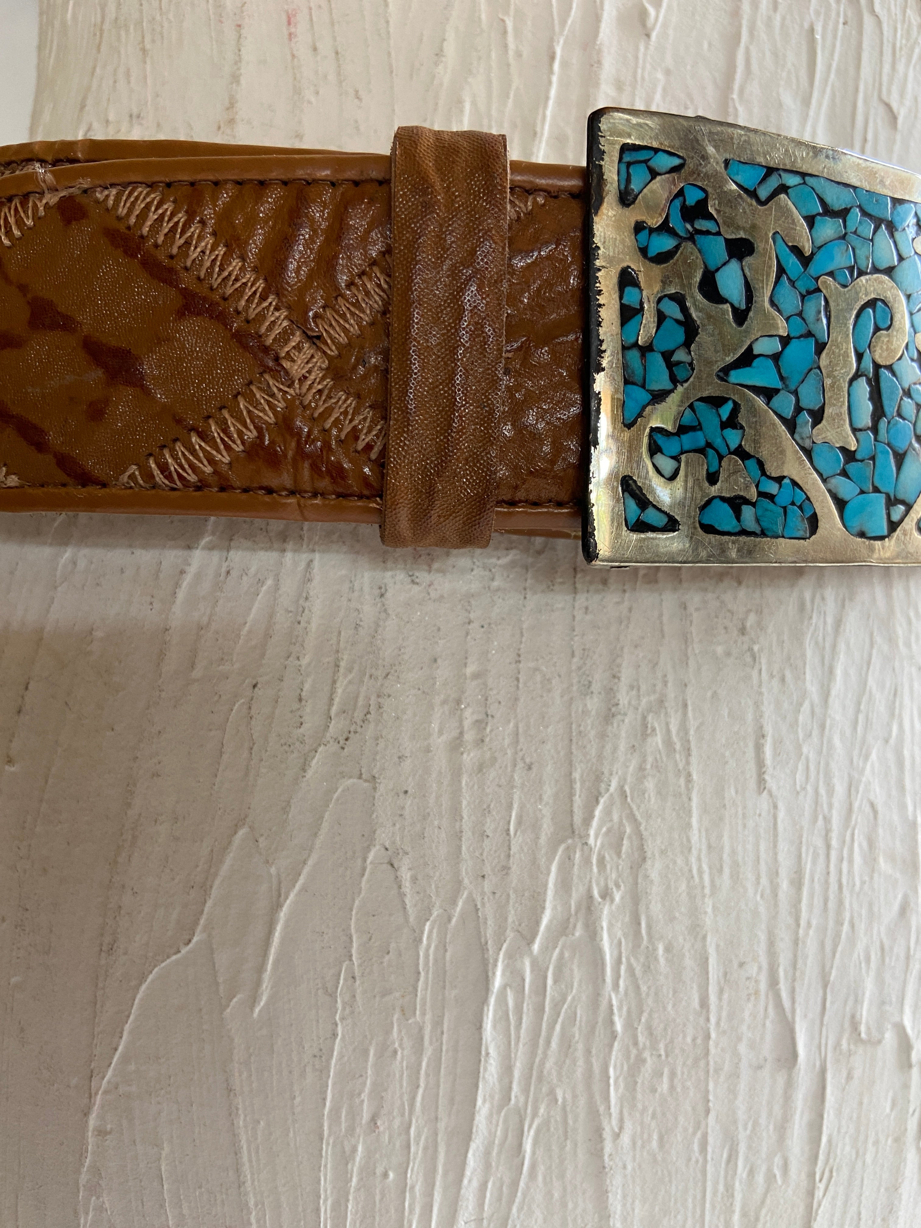 Turquoise Belt Buckle in a vintage leather tooled belt