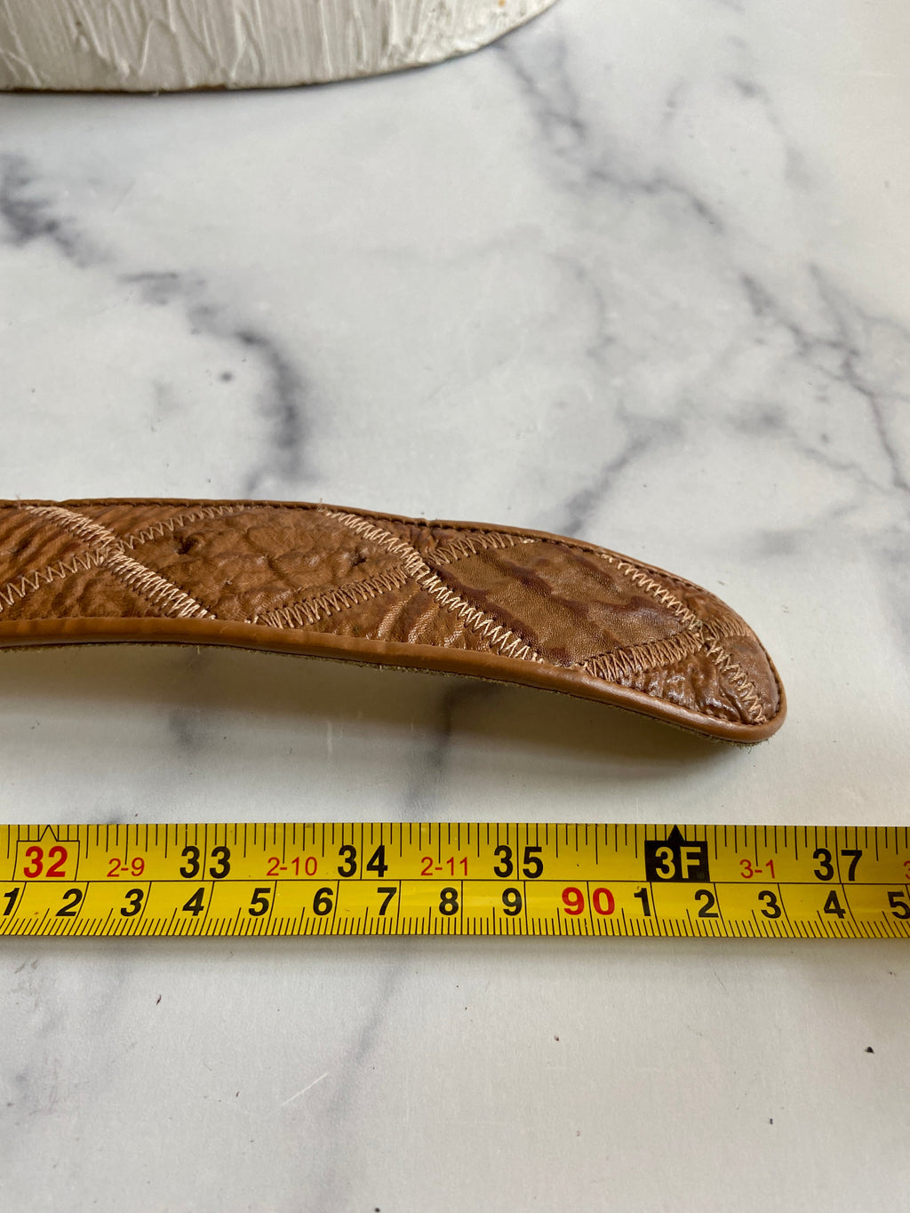 Turquoise Belt Buckle in a vintage leather tooled belt