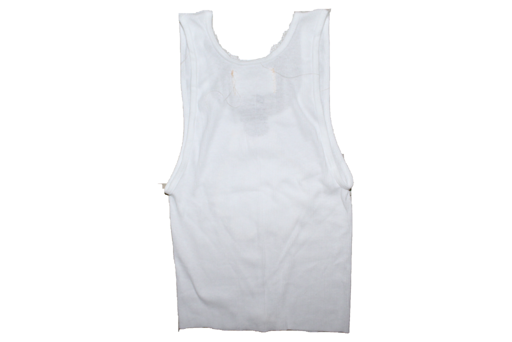 banana cookie . white tank .